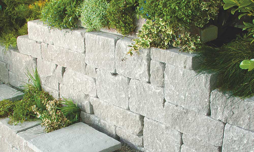 Gutshof murová tvárnica ŠM24 bosovaná 22,5 cm, sivá,  uložená v divokej väzbe Gutshof murová tvárnica ŠM24 bosovaná 22,5 cm, sivá,  uložená v divokej väzbe